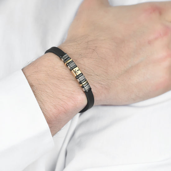 BRACCIALE UOMO SILICONE NERO CON ELEMENTI IN ACCIAIO IP GOLD E NERO CON ANCORA