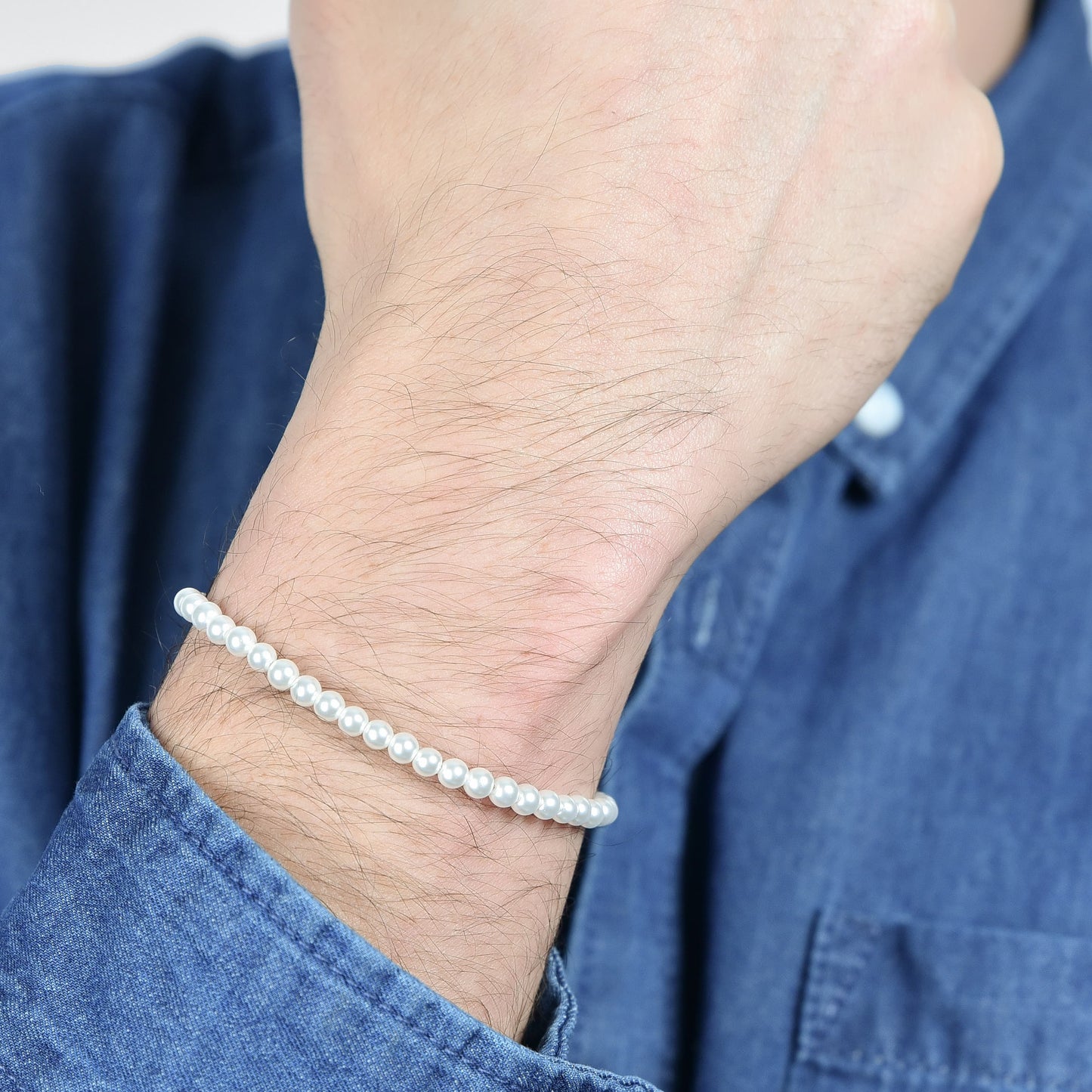 BRACCIALE UOMO IN ACCIAIO CON PERLE BIANCHE