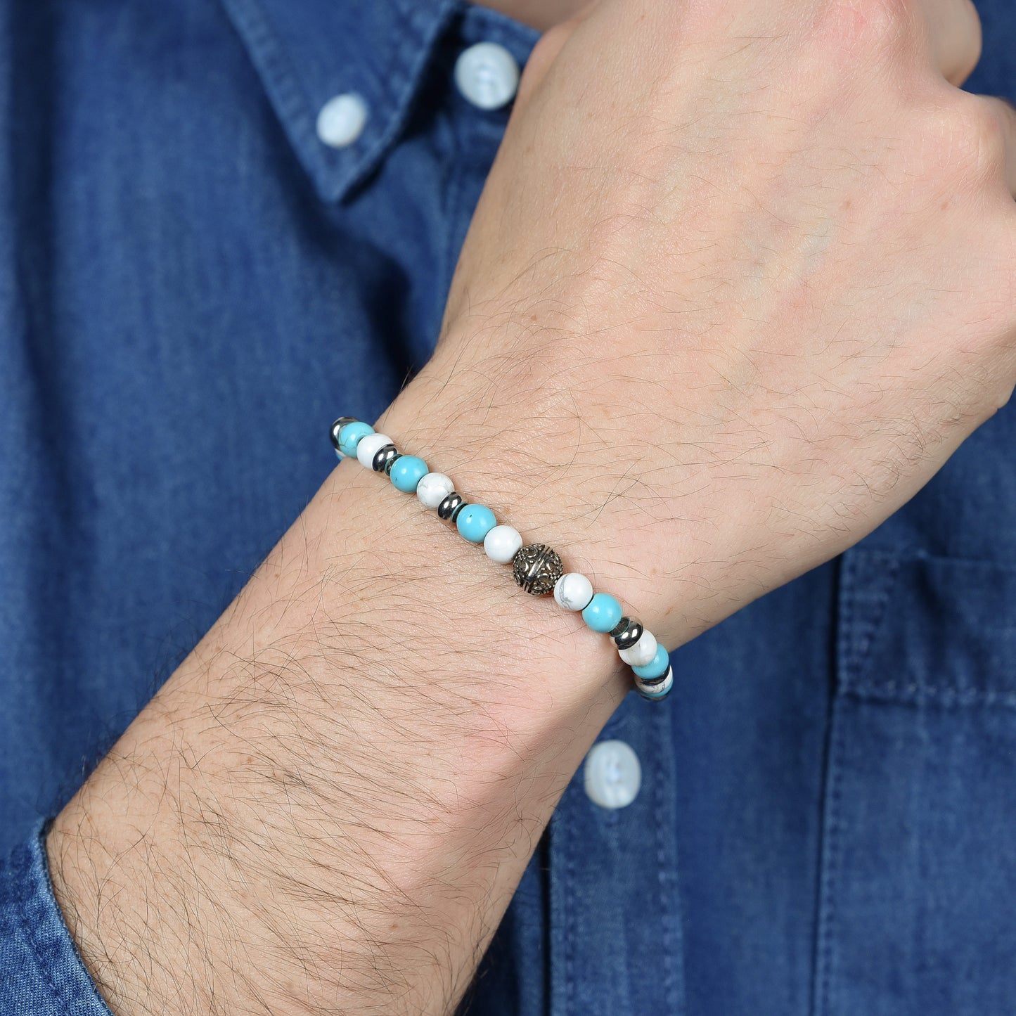 BRACCIALE UOMO ELASTICO CON PIETRE BLU E BIANCHE ED ELEMENTI IN ACCIAIO