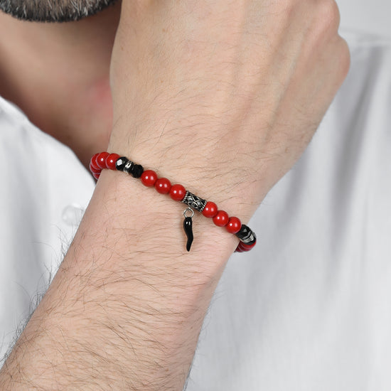 BRACCIALE UOMO ELASTICO CON PIETRE ROSSE E NERE E CORNO NERO