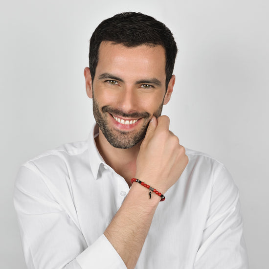 BRACCIALE UOMO ELASTICO CON PIETRE ROSSE E NERE E CORNO NERO