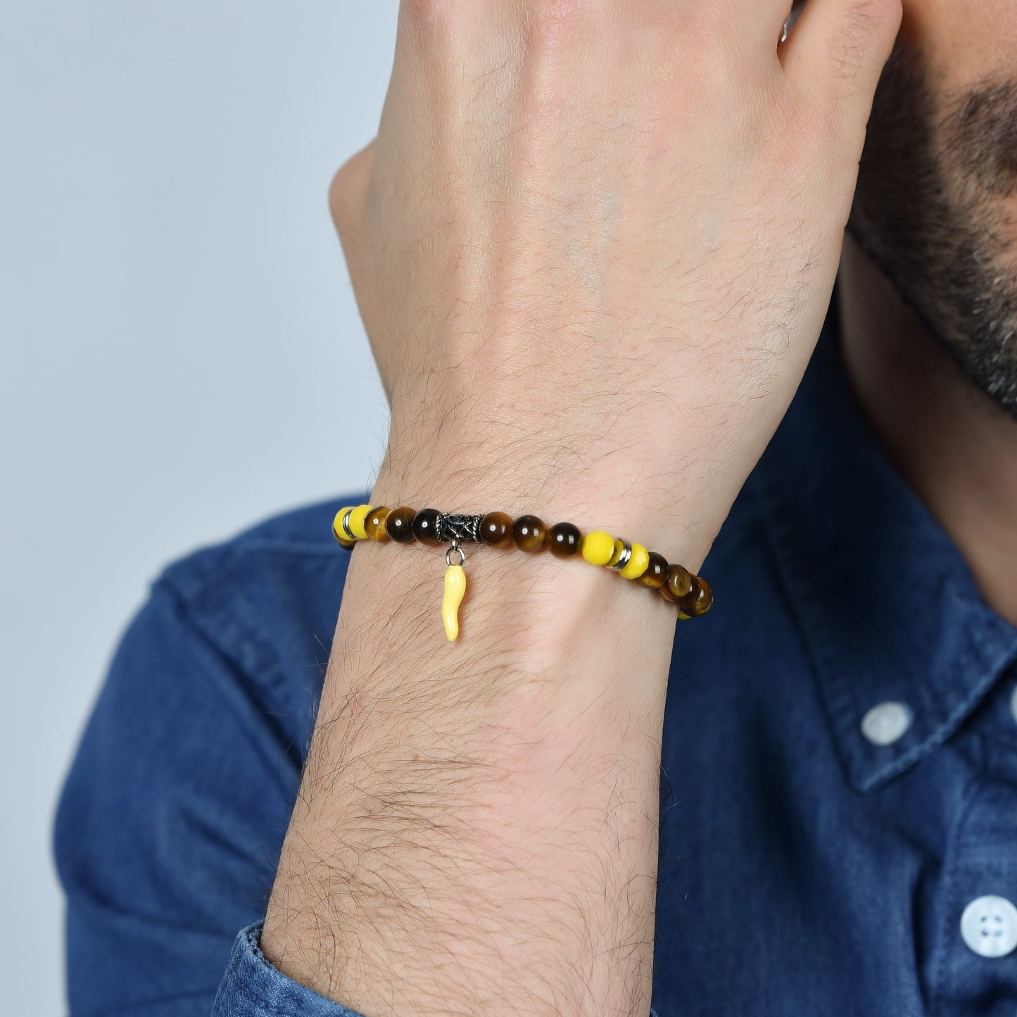 BRACCIALE UOMO ELASTICO CON PIETRE OCCHIO DI TIGRE E GIALLE E CORNO GIALLO