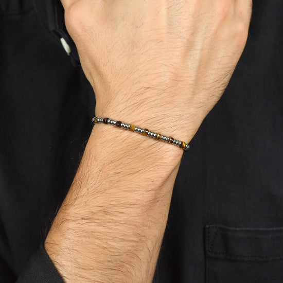 BRACCIALE UOMO IN ACCIAIO CON ELEMENTI SILVER E PIETRE OCCHIO DI TIGRE