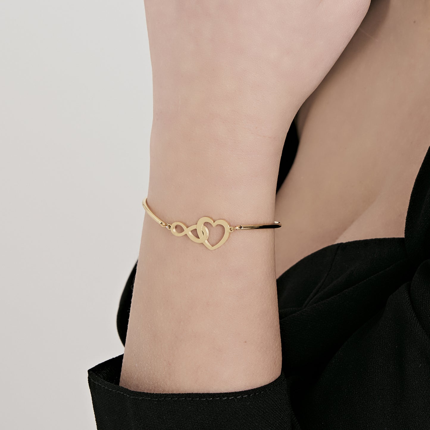 BRACCIALE DONNA IN ACCIAIO IP GOLD CON CUORE ED INFINITO