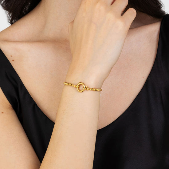 BRACCIALE DONNA IN ACCIAIO DORATO CON CERCHIO