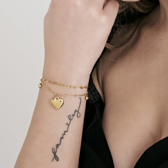 BRACCIALE DONNA IN ACCIAIO IP GOLD CON CUORE E CRISTALLI BIANCHI