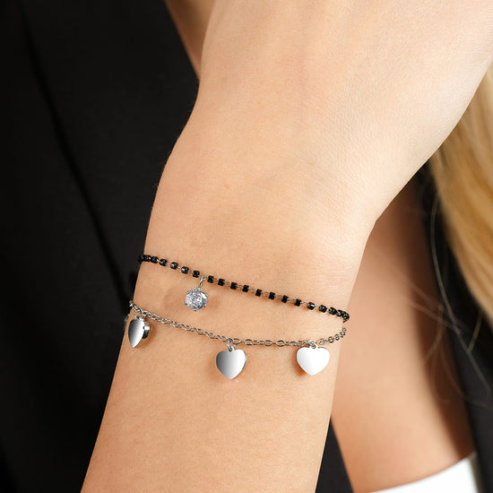 BRACCIALE DONNA IN ACCIAIO CON CUORI, ELEMENTI NERI E CRISTALLO BIANCO