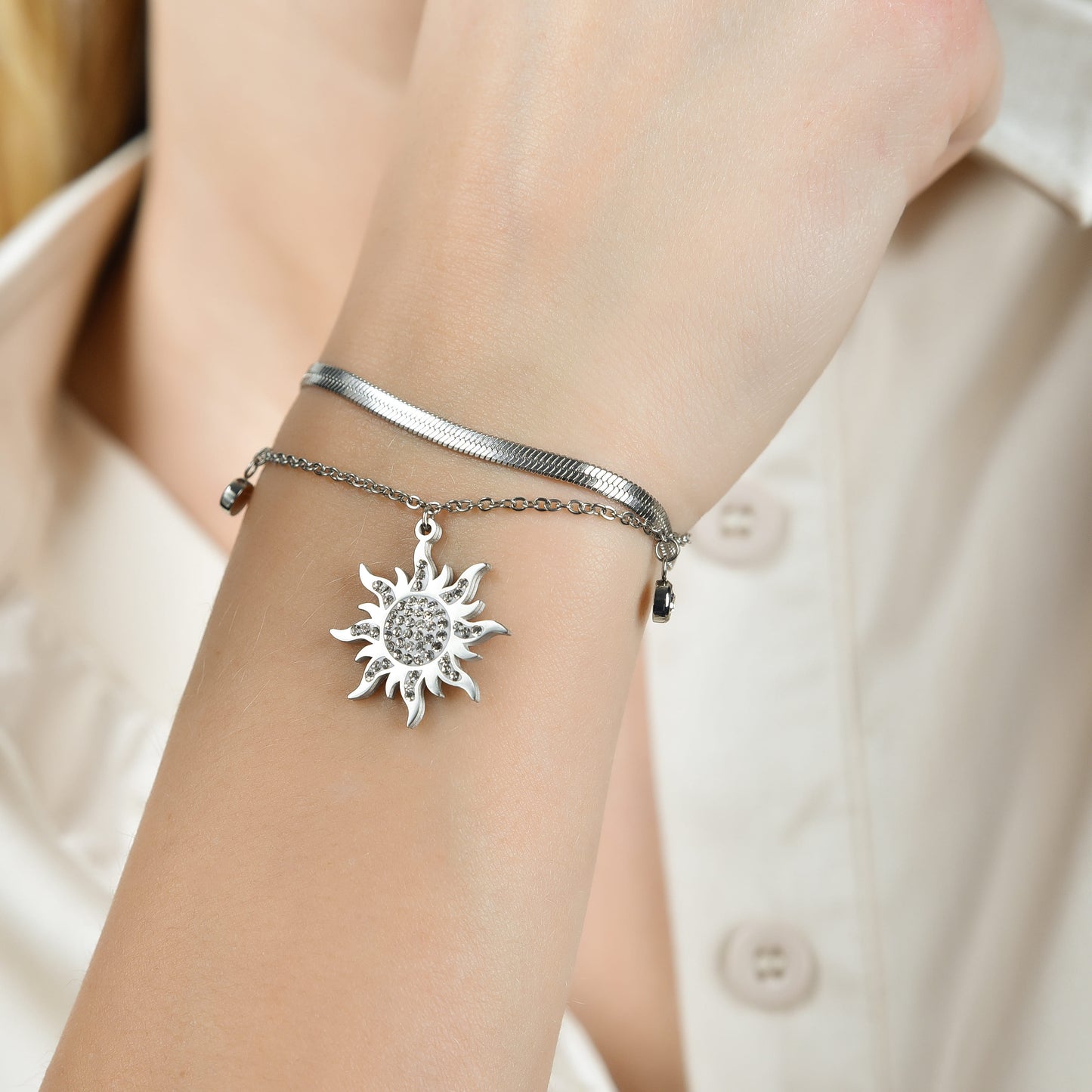 BRACCIALE DONNA IN ACCIAIO CON SOLE CON CRISTALLI BIANCHI