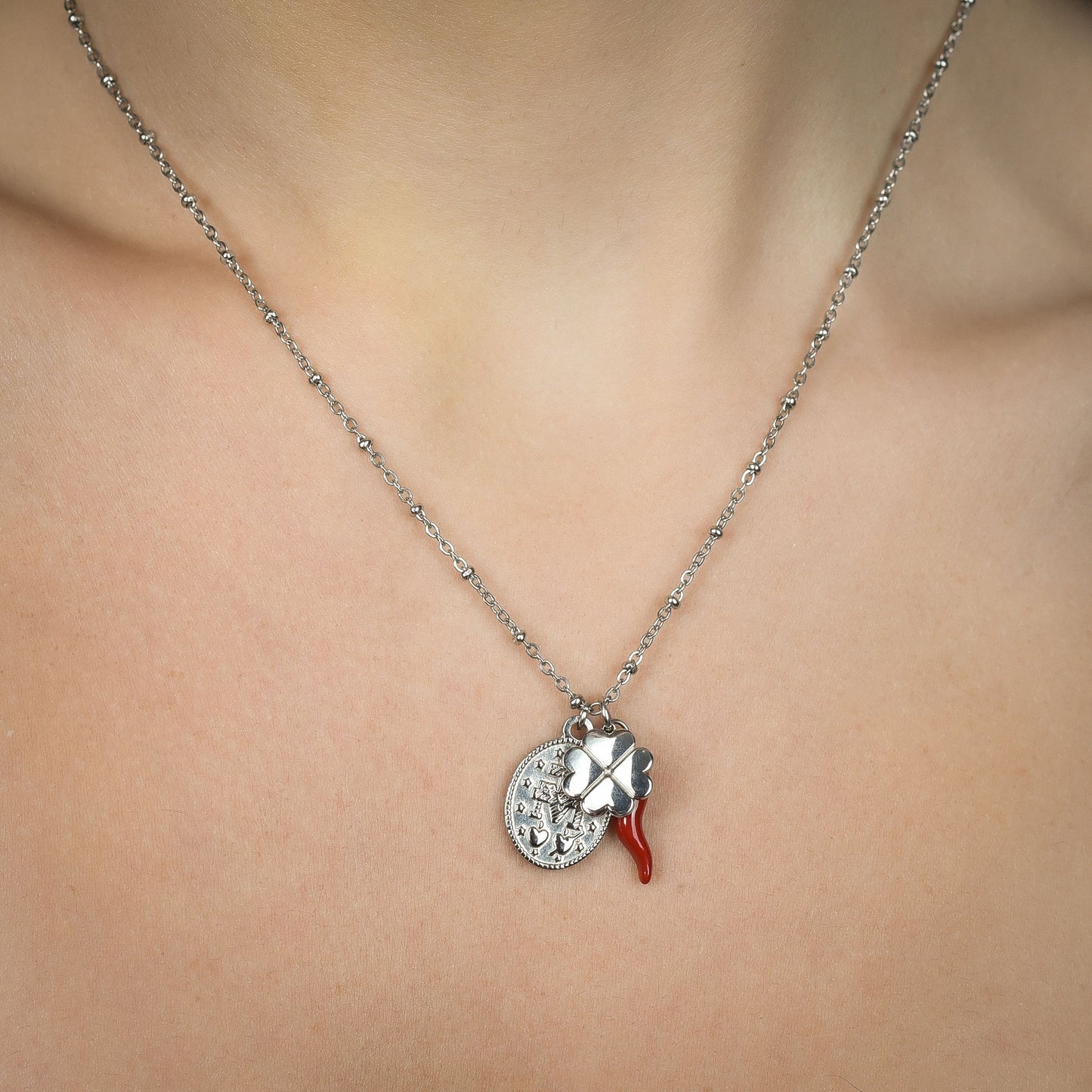 COLLANA DONNA IN ACCIAIO CON CHARM QUADRIFOGLIO, CORNO E MADONNA