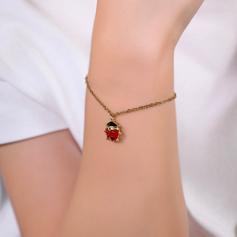 BRACCIALE BAMBINA IN ACCIAIO IP GOLD CON COCCINELLA Luca Barra