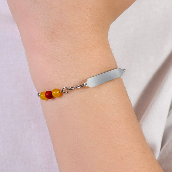 BRACCIALE BAMBINO IN ACCIAIO CON PIETRE GIALLE E ROSSE