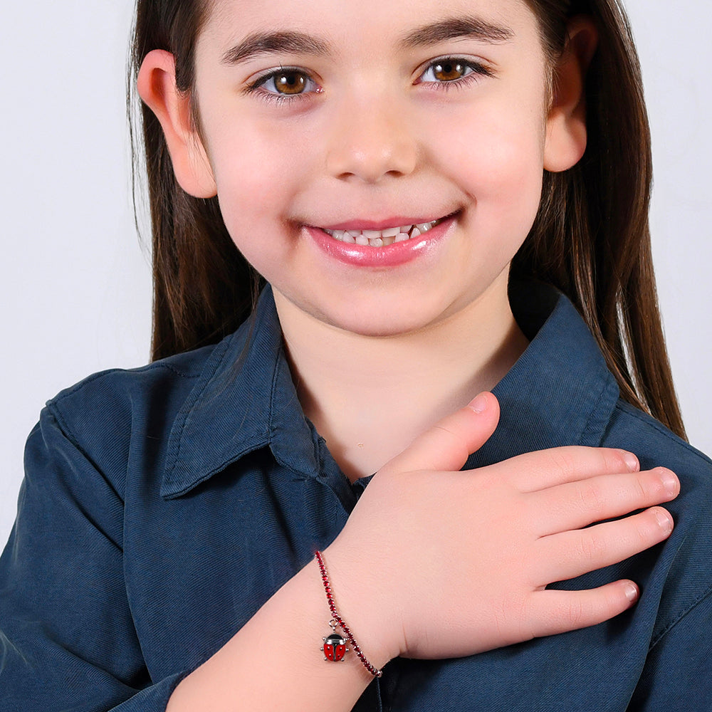 BRACCIALE TENNIS BAMBINA IN ACCIAIO CON CRISTALLI ROSSI E COCCINELLA