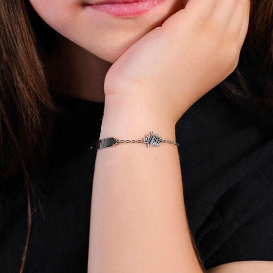 BRACCIALE BAMBINA IN ACCIAIO CON PIASTRA E CORONA CON CRISTALLI BIANCHI